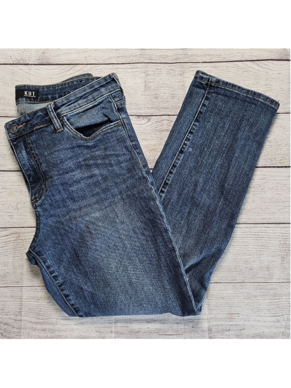 Kut from the Kloth sz 10 slim leg jeans with holey knees